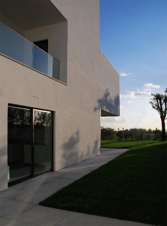 частный дом из бетона по проекту Pitagoras Arquitectos